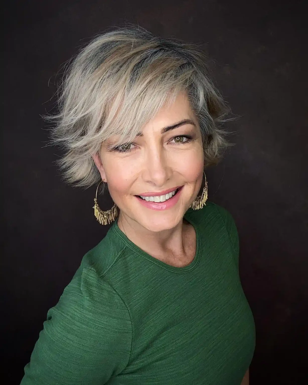 Silver long pixie with a sweeping front section on fine grey hair